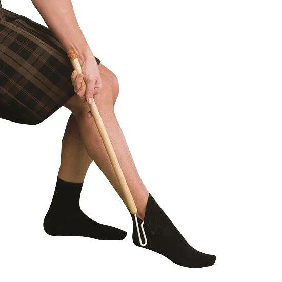 Homecraft dressing stick for disabled with a curved end for easy dressing assistance