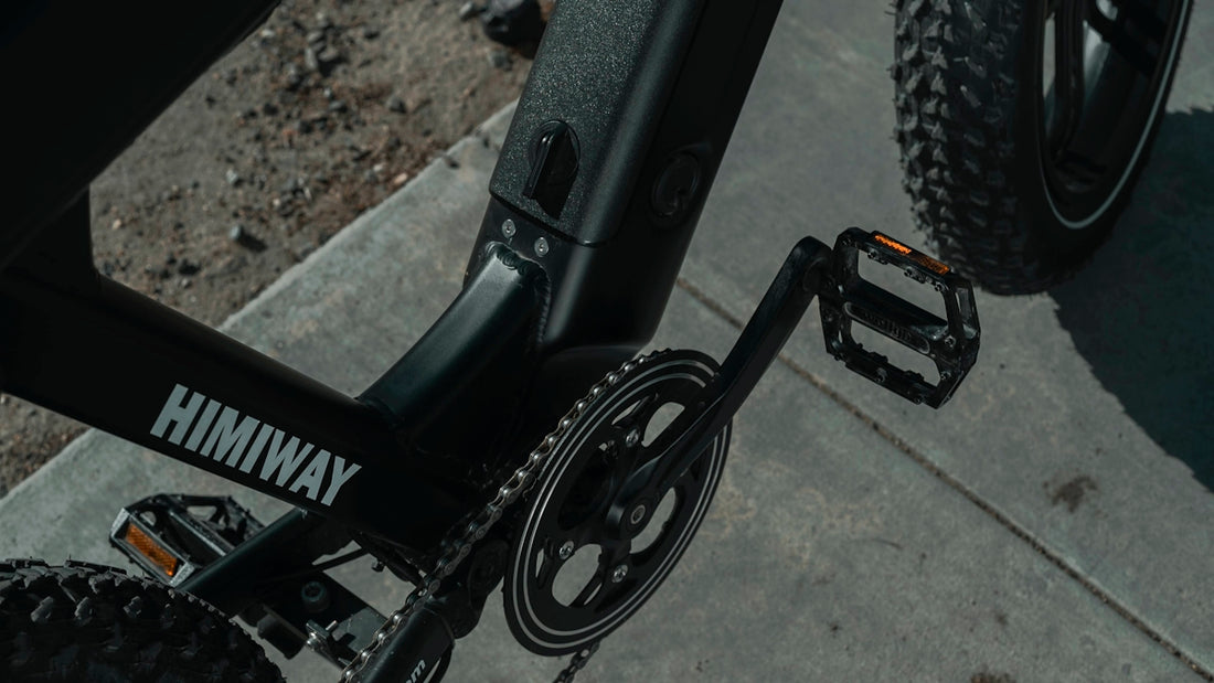 black bicycle on brown soil