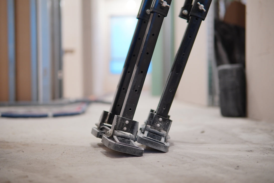 black metal stand on white floor