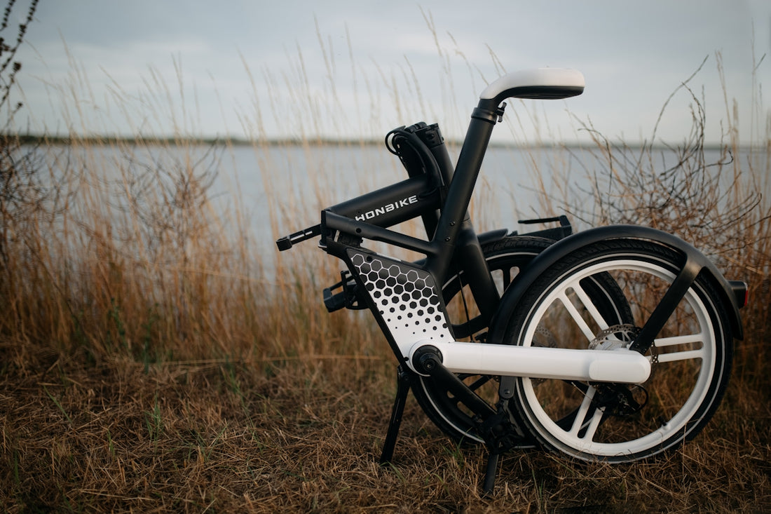 a bicycle parked on a grassy hill