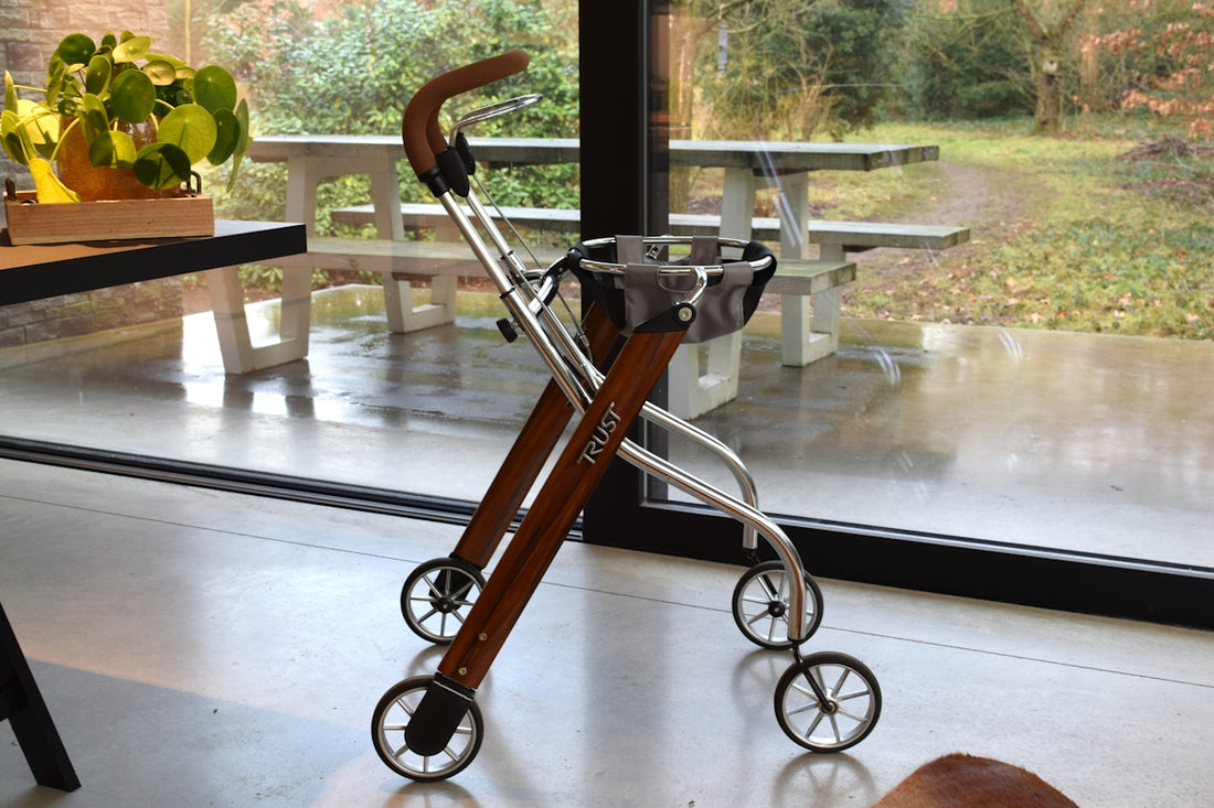 A modern walker with wheels and a basket.