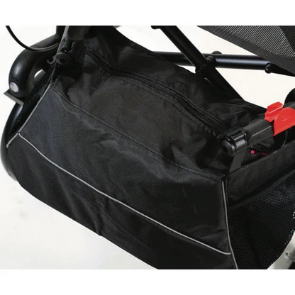 Close-up of black storage bag attached to stroller frame with zipper and red locking clip