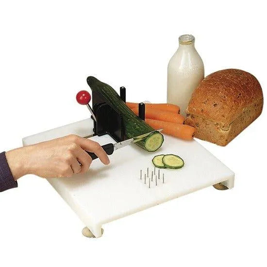 Etac food preparation system for disability with cutting board, knife, and food items for easier meal prep