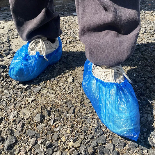 Blue 4MOBILITY WA Shoe Protector cover ensures dry shoes while walking outdoors on wet surfaces
